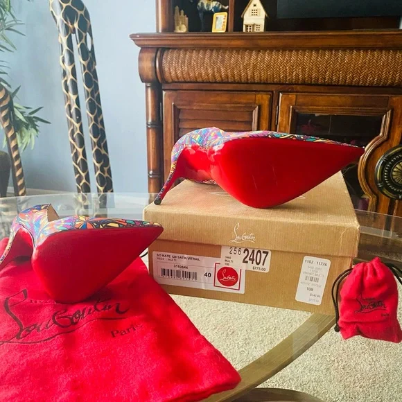 Christian Louboutin heels with a pointed toe. Size run small fits like a 7.5. - Picture 3 of 3